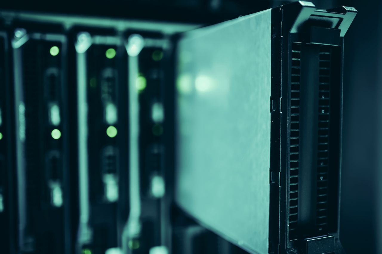Home Close-up of server racks in a data center highlighting modern technology infrastructure.